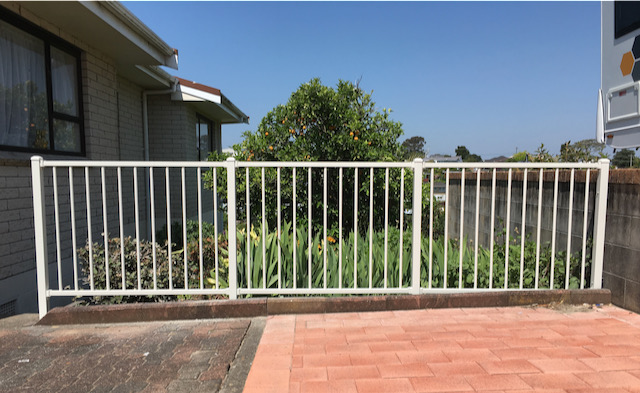 White Metal Vertical Bar Fence